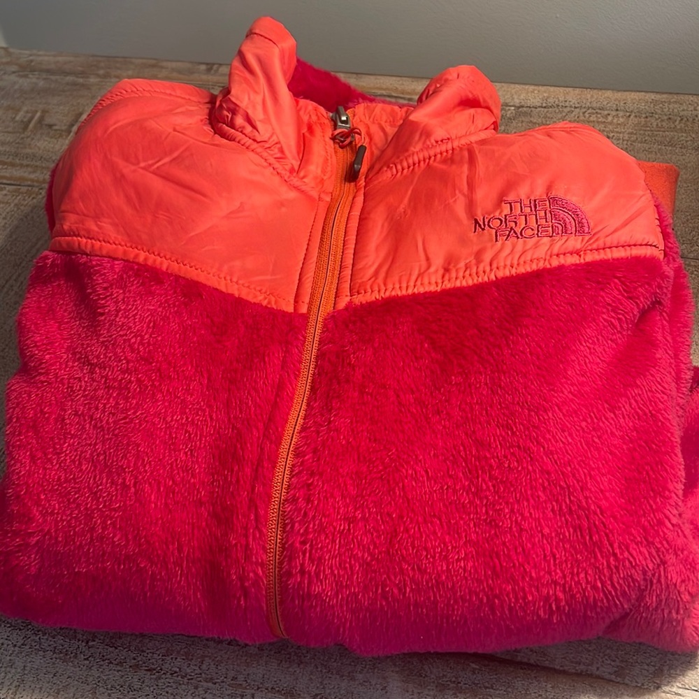 The North Face Women’s pink / orange lightweight fleece jacket